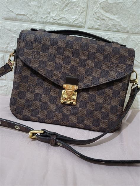 louis vuitton pochette metis damier ebene|Meer.